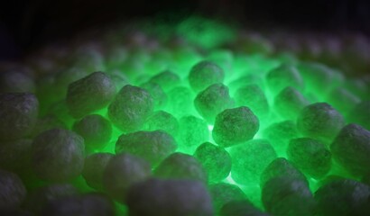 polystirene balls , green glowing  light background