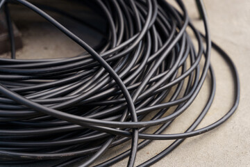 Bundle of Black Wires on Table