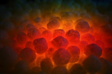 polystirene balls , textured glowing background