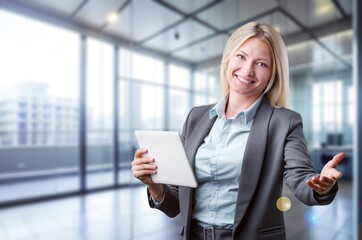 stylish professional woman CEO with digital tablet