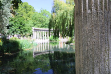 Fototapeta na wymiar Monceau park , famous and buccolic french urban garden , antiques colonnes