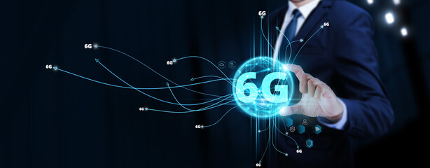 6G: Futuristic Connectivity, Businessman Touching Digital Global Network of 6G Data Exchange....