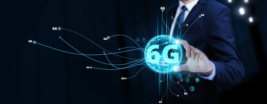 6G: Futuristic Connectivity, Businessman Touching Digital Global Network of 6G Data Exchange. Seamless Integration on Social Network Connection with Hologram Modern Interface, Advancing Communication. - Powered by Adobe