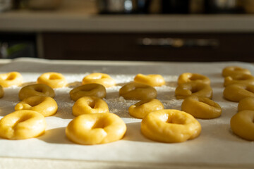 Homemade raw dough on the table waiting to be baked.