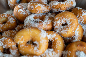 Detailed view of a pile of homemade rosquillas, a traditional dessert made in Easter in Spain, similar to donuts.