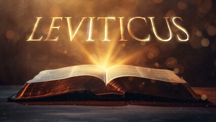 Book of Leviticus. Open bible revealing the name of the book of the bible in a epic cinematic presentation. Ideal for slideshows, bible study, banners, landing pages, religious cults and more
