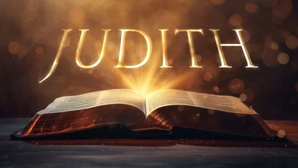 Fotobehang Book of Judith. Open bible revealing the name of the book of the bible in a epic cinematic presentation. Ideal for slideshows, bible study, banners, landing pages, religious cults and more © ana