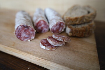 delicious traditional french saucissons on a cutting board