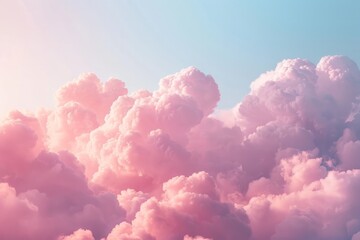 Fluffy pink clouds in a pastel sky