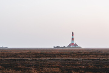 Westerheversand lighthouse on the North Sea a landmark of the Eiderstedt peninsula in Germany.