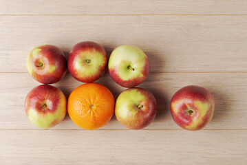 Apples and orange with blurred square overlay - 750932405