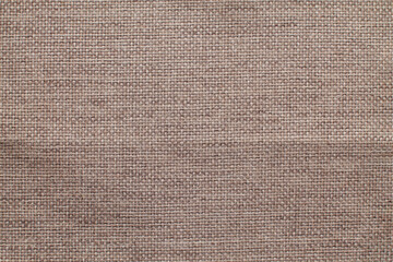 Close-up detail of fabric natural color Hemp material pattern design wallpaper. can be used as background or for graphic design