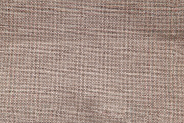 Fototapeta na wymiar Close-up detail of fabric natural color Hemp material pattern design wallpaper. can be used as background or for graphic design