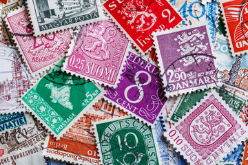 Ukraine, Kiyiv - January 12, 2023 Finland Postage stamps..Postage stamps.A collection of world stamps in a pile.Postage stamps from different countries and times