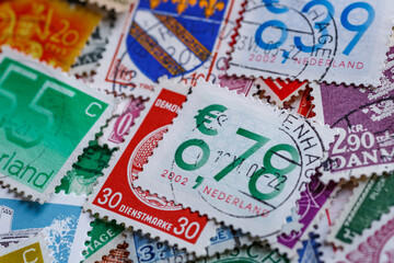 Ukraine, Kiyiv - January 12, 2023 Netherlands Postage stamps..Postage stamps.A collection of world stamps in a pile.Postage stamps from different countries and times