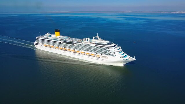 Cruise liner ship sailing across Mediterranean sea. Aerial view