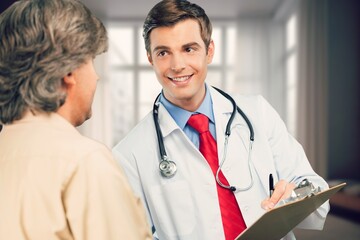 doctor consulting patient in clinic setting