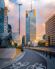 Warsaw, Poland - a view of a skyscraper in the business part of the city. Office buildings in the Center of Warsaw. Sunset in the city	