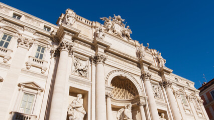 Historical statues and building at Trevi Fountain