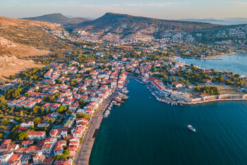 Panorama of Foca or Phokaia resort town with roofs of historic houses in Izmir region, aerial view