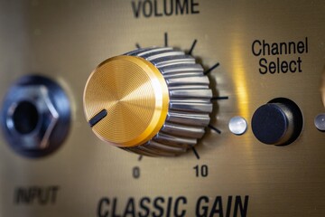 volume control panel, Close-up of a guitar tube amplifier