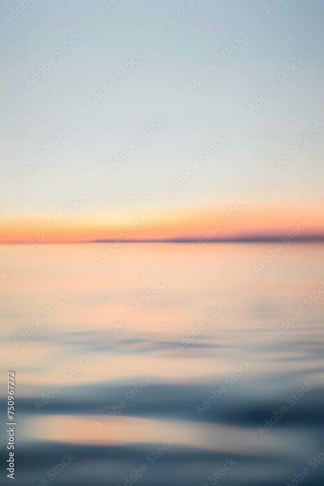 Poster blurry photo of the ocean at sunset. ideal for backgrounds and relaxation concepts