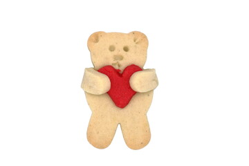 Cute cookie bear with red heart isolated on white. Valentine's day celebration