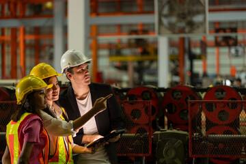 professional engineer,worker,technician use clipboard discuss work, walk in steel metal manufacture...