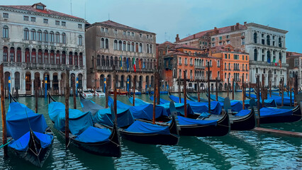 Fototapeta premium Medieval houses, narrow canals, bridges and gondolas in Venice, Italy, February 10, 2024.