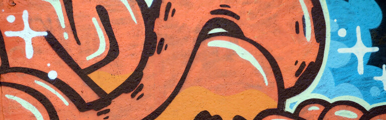 Colorful background of graffiti painting artwork with bright aerosol outlines on wall. Old school...