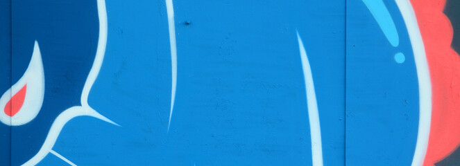 Colorful background of graffiti painting artwork with bright aerosol outlines on wall. Old school...