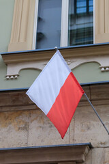 Flag of Poland on a facade of building