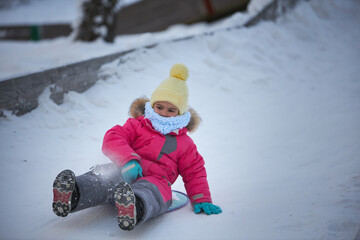 Frozen Delight, A Tiny Snowboarder Finds Joy in the Winter Wonderland