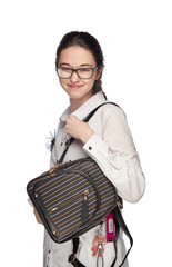 The Spectacled Wanderer: A Woman in Glasses Clutches a Stylish Purse