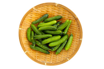 Mini cucumbers on white background.