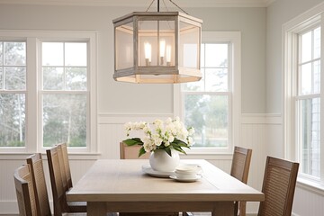 Seaside Serenity: Coastal Cottage Dining Room Ideas with Lantern Pendant Light in White and Sandy Colors