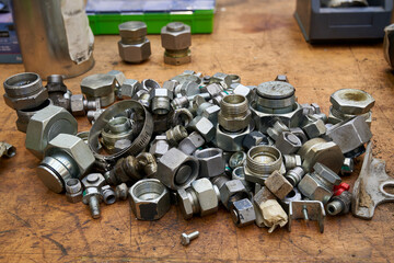 Different hydraulic fittings after equipment repair