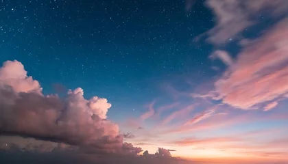 Poster close up of twilight sky with pink clouds and stars © Raymond