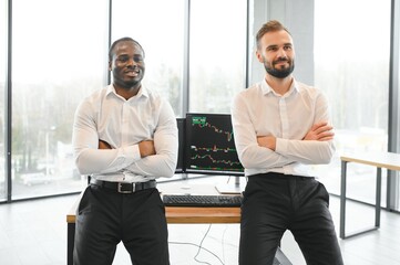 Two diverse crypto traders brokers stock exchange market investors discussing trading charts...