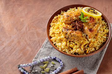 Spiced Chicken Biryani in Clay Bowl for Ramadan Iftar, Copy Space, Top view
