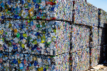 blocks of crushed aluminum cans waiting to be recycled and sold
