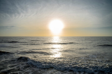 Sunrise at sea with sky and sun