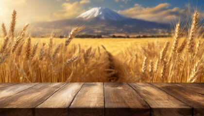 Wood board table in front of blurred wheat field background