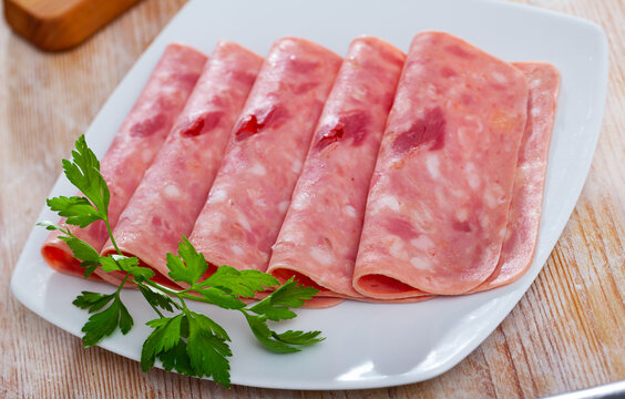 Image of slices of traditional chopped ham, close-up