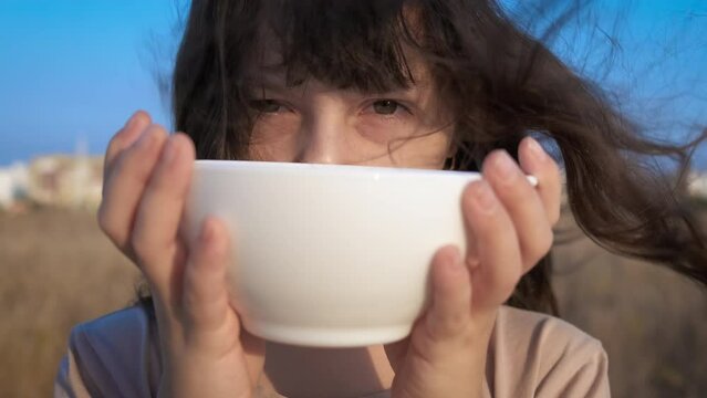 Child with plate during poverty. A sad little girl with plate feel hungry during lean year.