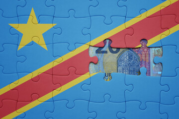 puzzle with the national flag of democratic republic of the congo and euro banknote. finance concept