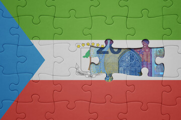 puzzle with the national flag of equatorial guinea and euro banknote. finance concept