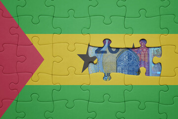 puzzle with the national flag of sao tome and principe and euro banknote. finance concept