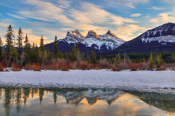 Winter sunset at The Three Sisters, a trio of peaks near Canmore, Alberta, Canada - 751029882