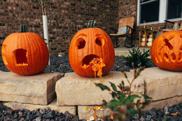 Seeds spewing out of pumpkin. 